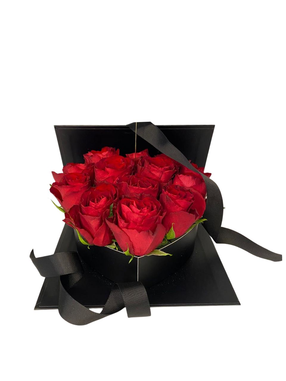 Black box with red roses on a white background
